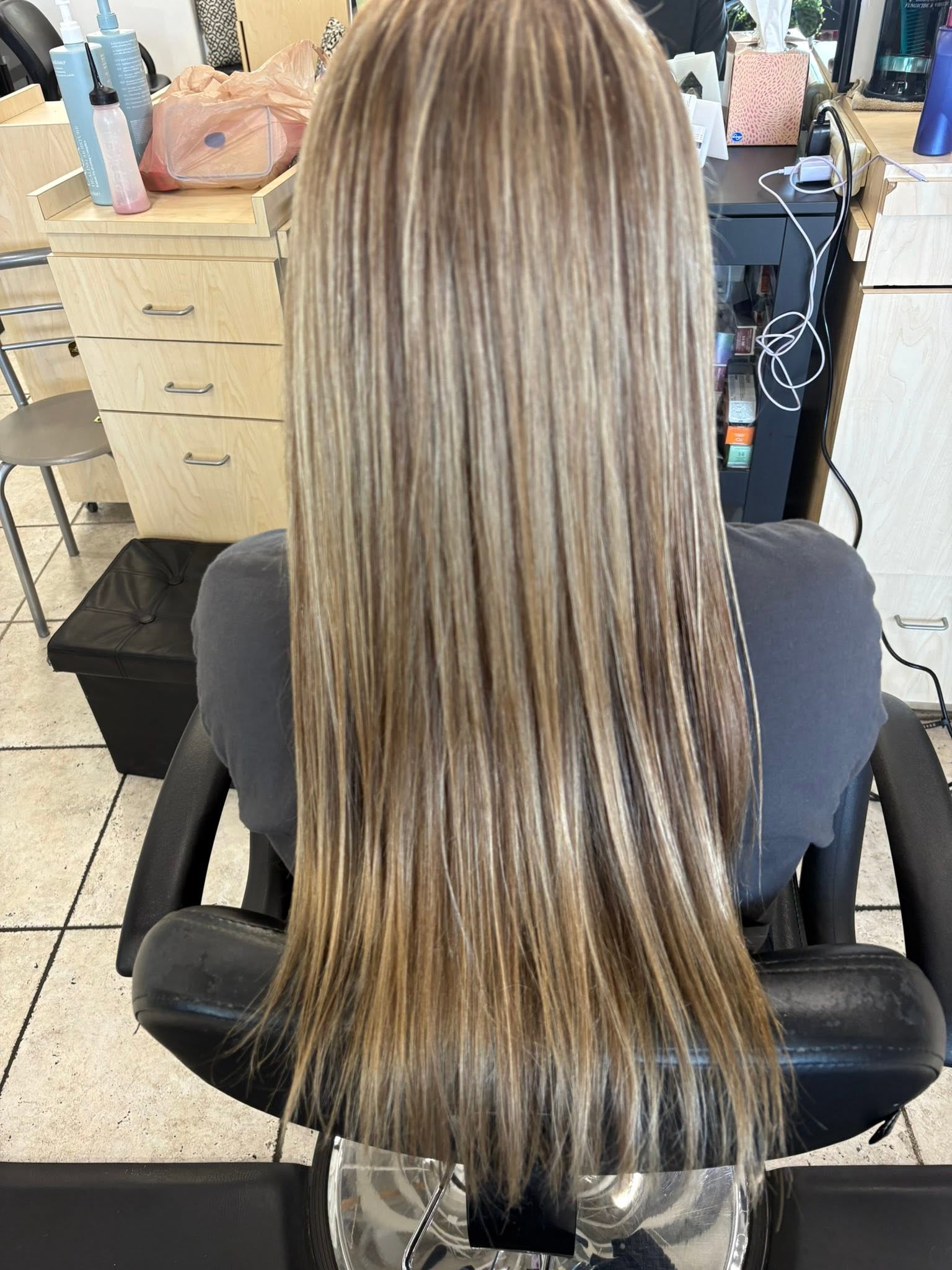 Back view of dimensional color on long hair