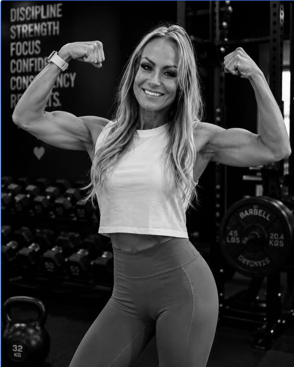 Heidi Mancini flexing in a gym